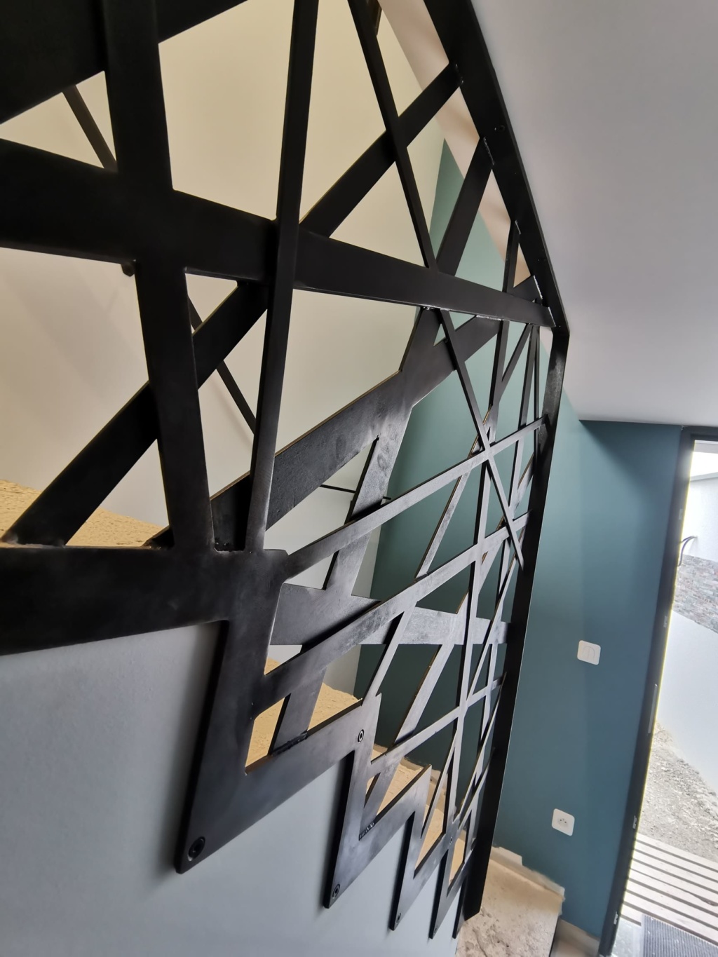 Structure de garde-corps en plats d’acier