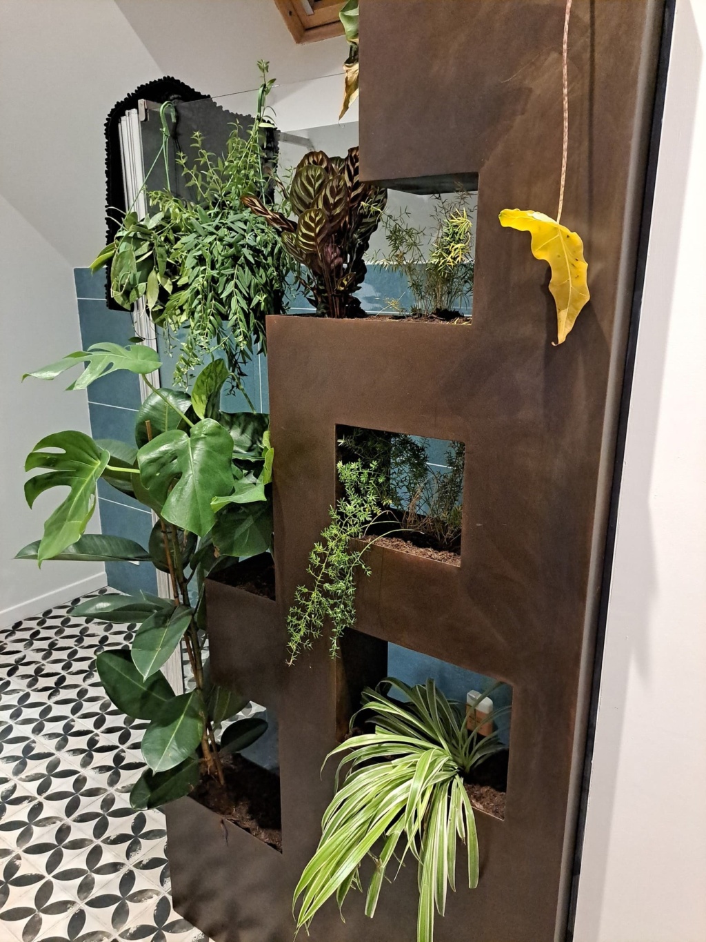 Paroi séparative en acier Corten entre salle de bain et douche